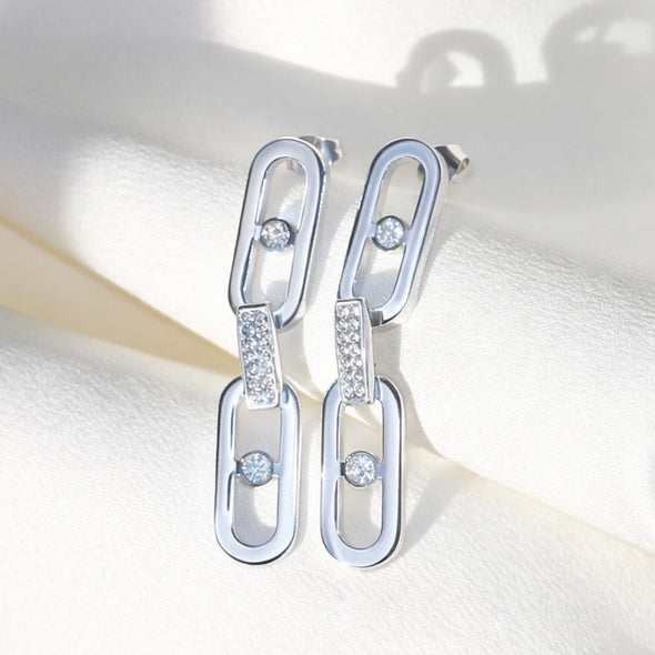 Boucles d’oreilles pendantes argentées en acier inoxydable et pierres scintillantes | Jade