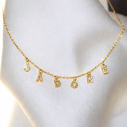 Collier doré en acier inoxydable et pierres scintillantes | J'ADORE