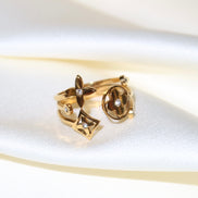 Bague ajustable dorée trèfles et étoiles en acier inoxydable | Thelma