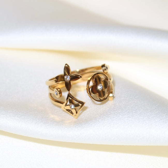 Bague ajustable dorée trèfles et étoiles en acier inoxydable | Thelma