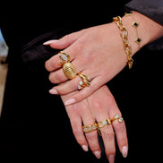 Bracelet fin, noir et doré en acier inoxydable | Régina